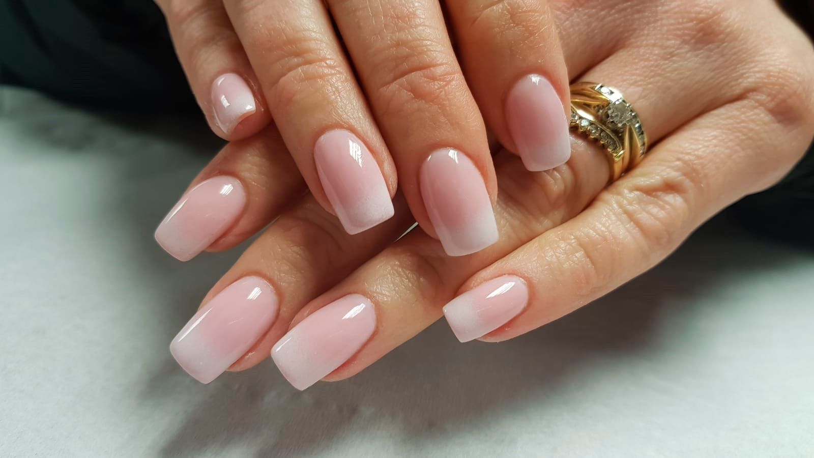 Glossy pale pink square-shaped nails